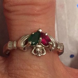 Claddagh ring with ruby & emerald. 10k white gold